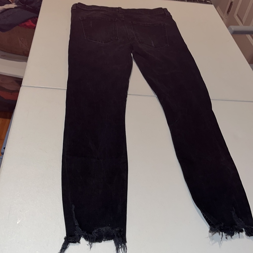 Free People size 27 Black Wash  skinny jeans distressed with raw hem